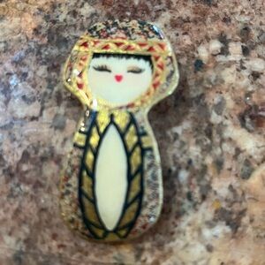 Kokeshi Handcrafted Doll Brooch with Gold and Red Accents